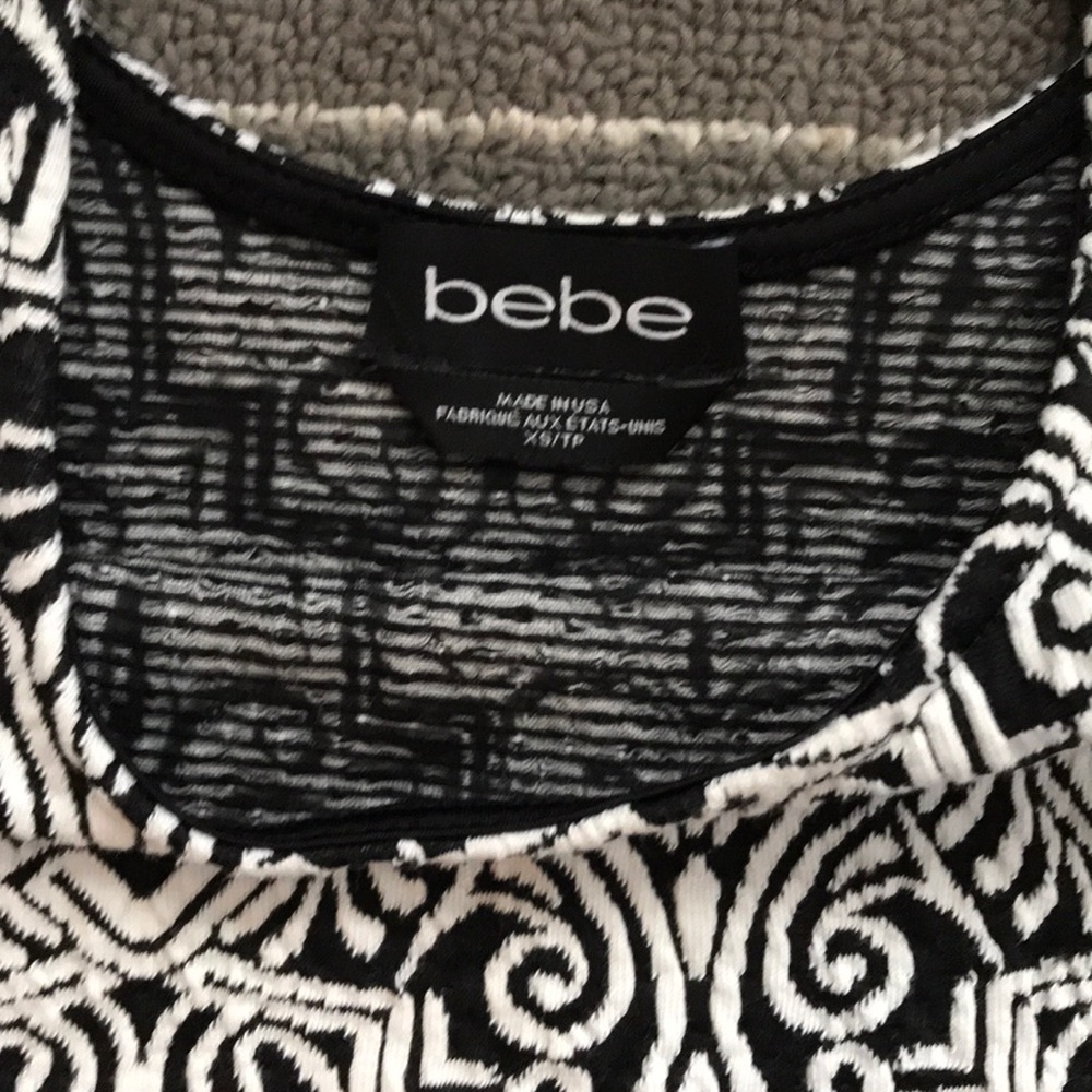 Bebe Peplum Top - Picture 2 of 3
